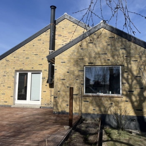 Facaderenovering af bolig i Kastrup på Amager med omfugning af murværk.